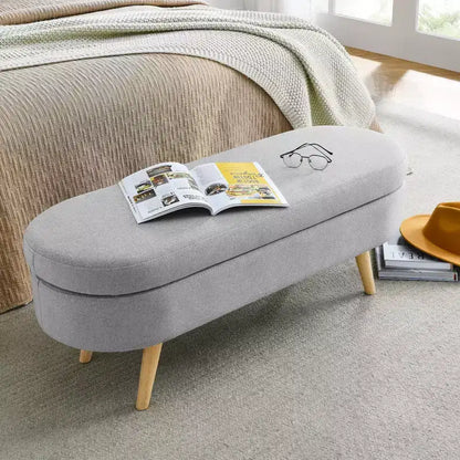 Panca contenitore ovale con gambe in legno di gomma e rivestimento in lino trapuntato – Contenitore nascosto