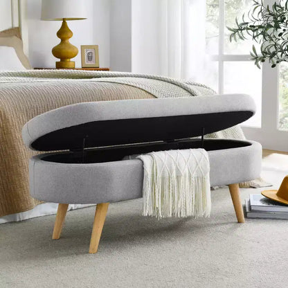 Panca contenitore ovale con gambe in legno di gomma e rivestimento in lino trapuntato – Contenitore nascosto