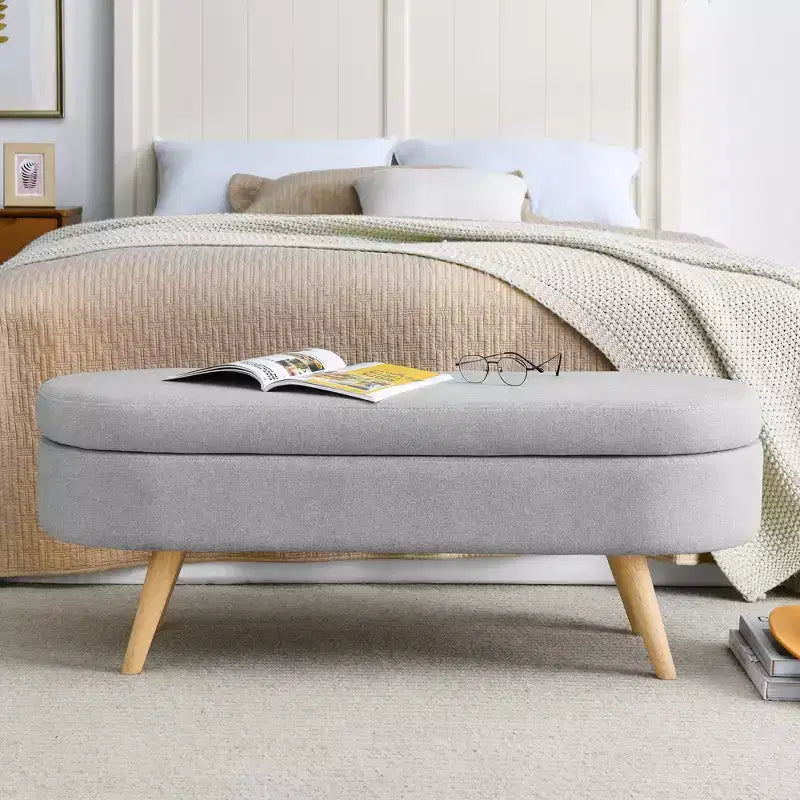 Panca contenitore ovale con gambe in legno di gomma e rivestimento in lino trapuntato – Contenitore nascosto