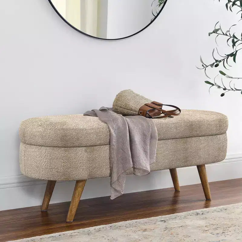Panca contenitore ovale con gambe in legno di gomma e rivestimento in lino trapuntato – Contenitore nascosto