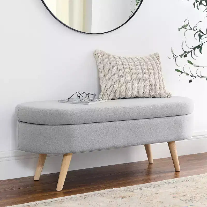 Panca contenitore ovale con gambe in legno di gomma e rivestimento in lino trapuntato – Contenitore nascosto